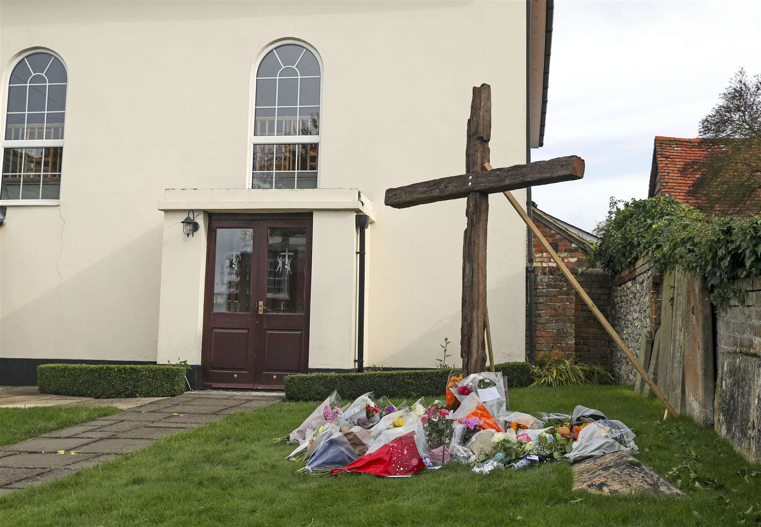 Floral tributes left outside Chinnor Community Church in Oxfordshire (Steve Parsons/PA)