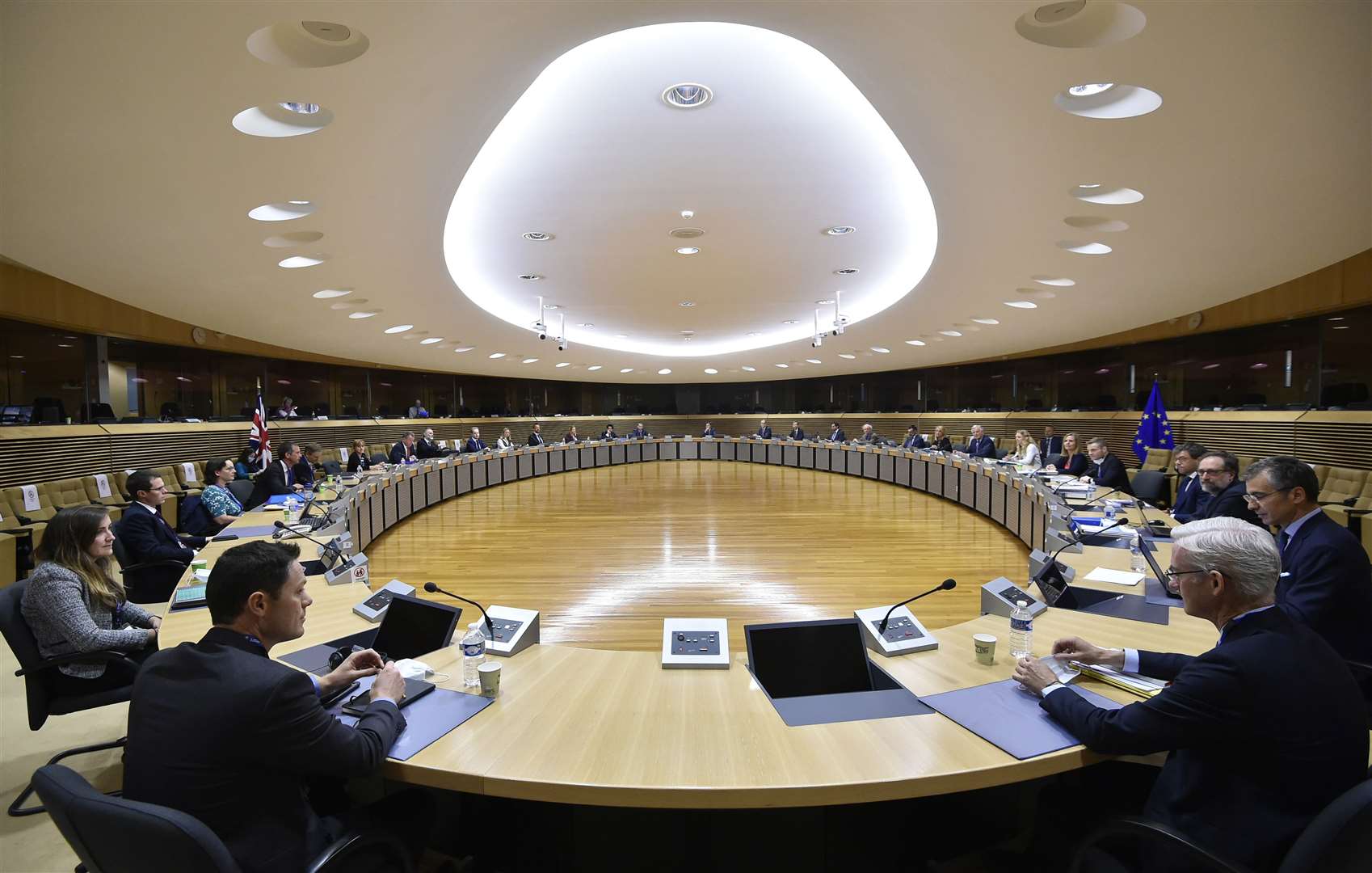 EU negotiator Michel Barnier and British Brexit negotiator David Frost attend a meeting with their delegations at EU headquarters in Brussels (John Thys/Pool/AP)