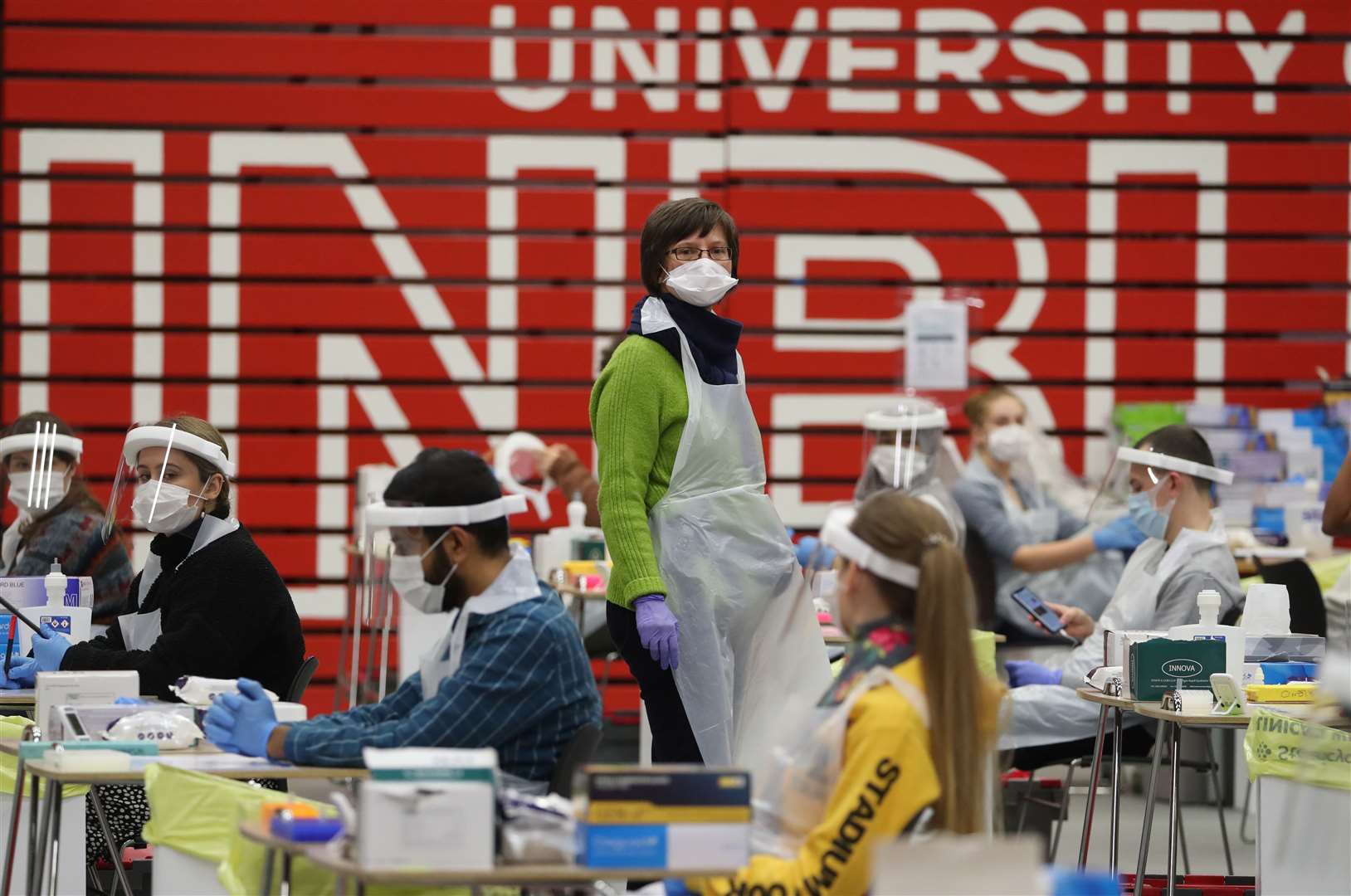 People carry out asymptomatic testing at Edinburgh University ahead of students being allowed to travel home for the Christmas holidays (Andrew Milligan/PA)