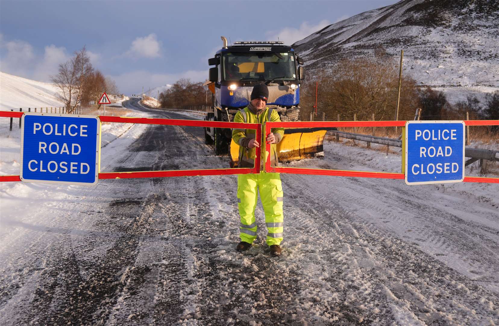 The snow gates have been closed on the A93 in Spittal of Glenshee, in the Highlands (Andrew Milligan/PA)