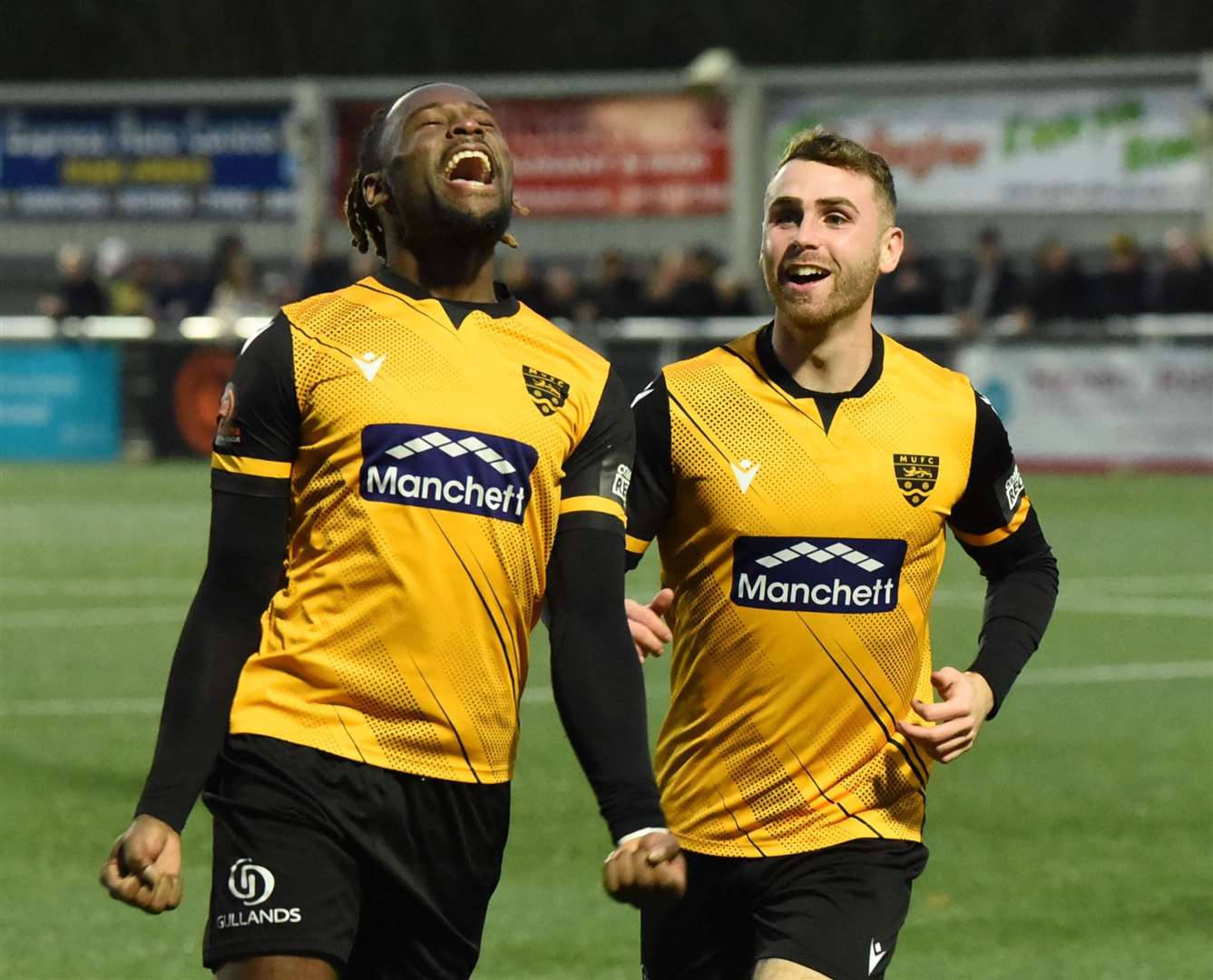 Christie Pattisson, left, celebrates scoring for Maidstone with George Fowler. Picture: Steve Terrell