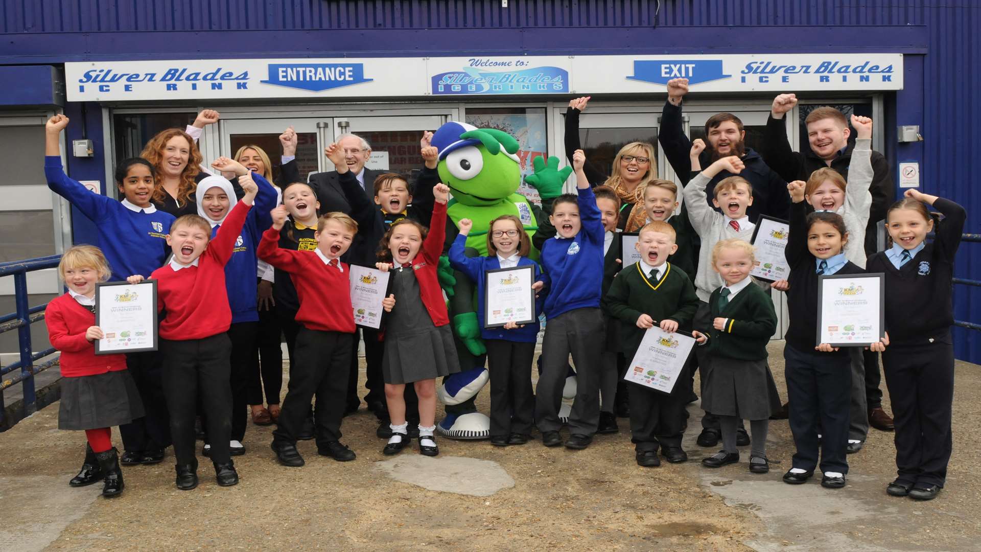 Walk to school and literacy winners celebrate at Silver Blades ice rink with supporters from Medway Council, Ashford Borough Council and Specsavers.