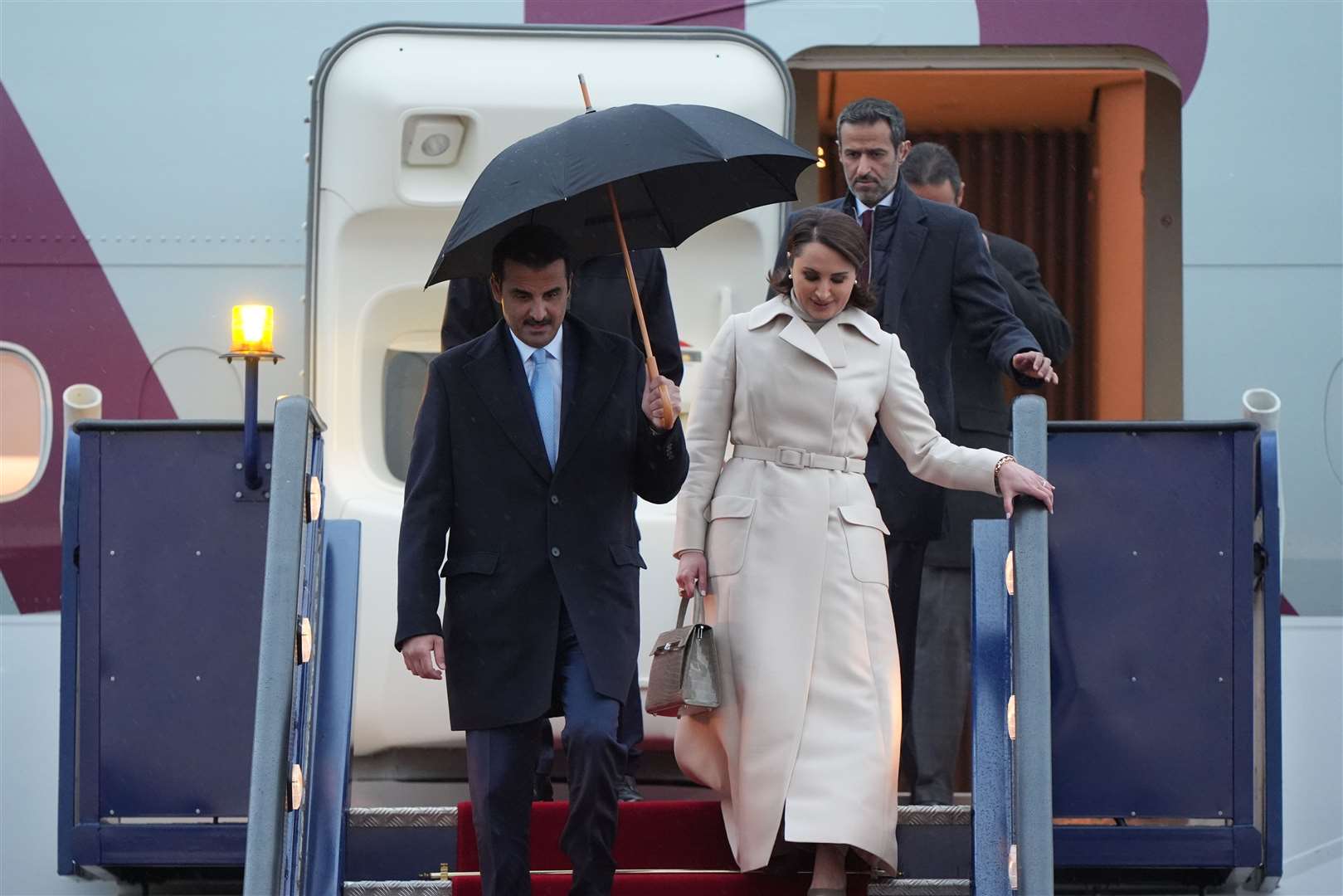 The Emir of Qatar Sheikh Tamim bin Hamad Al Thani, and Sheikha Jawaher, arrive at Stansted Airport on Monday ahead of the state visit hosted by the King (Joe Giddens/PA)