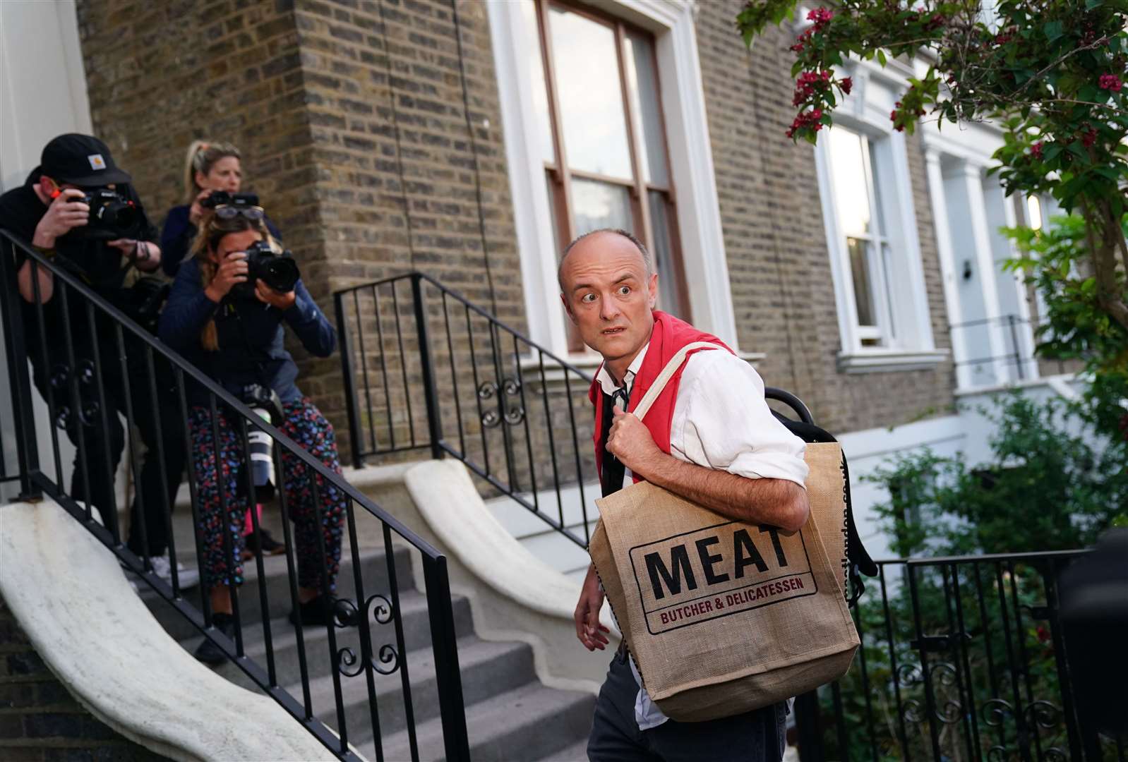 Dominic Cummings arrives at his north London home. He twice went from Downing Street to his house on the day of his trip to Durham, in the face of isolation guidelines (Aaron Chown/PA)