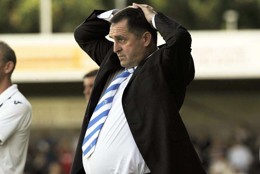 A head in hands moment for Gillingham boss Martin Allen.