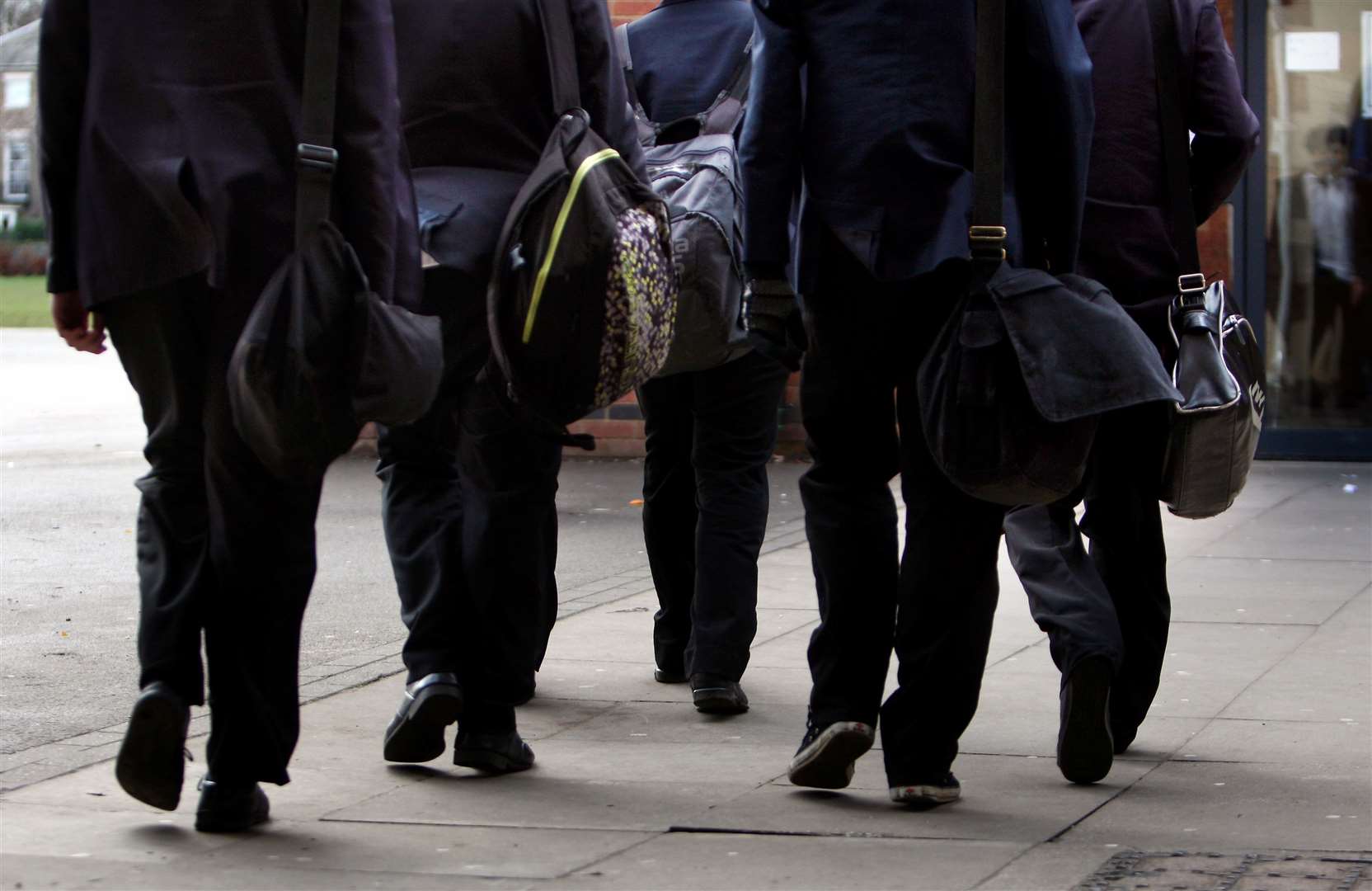 Schools should check if it is actually feasible to cram everything in your school bag on any given day. Picture: David Jones/PA