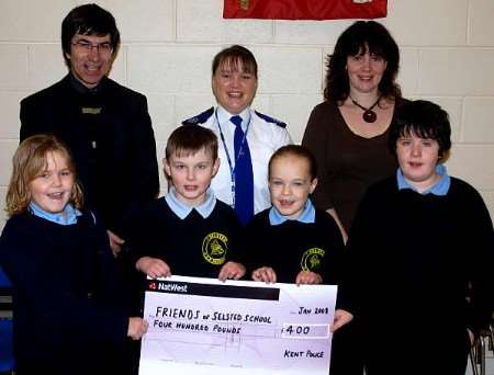 Pictured, back, left to right, head teacher Kevin Bailey, PCSO Sarah Wallace and Sarah Redmond of FOSS. Front, left to right, pupils Richard Stroud, Brooke Lang and Louise Evans