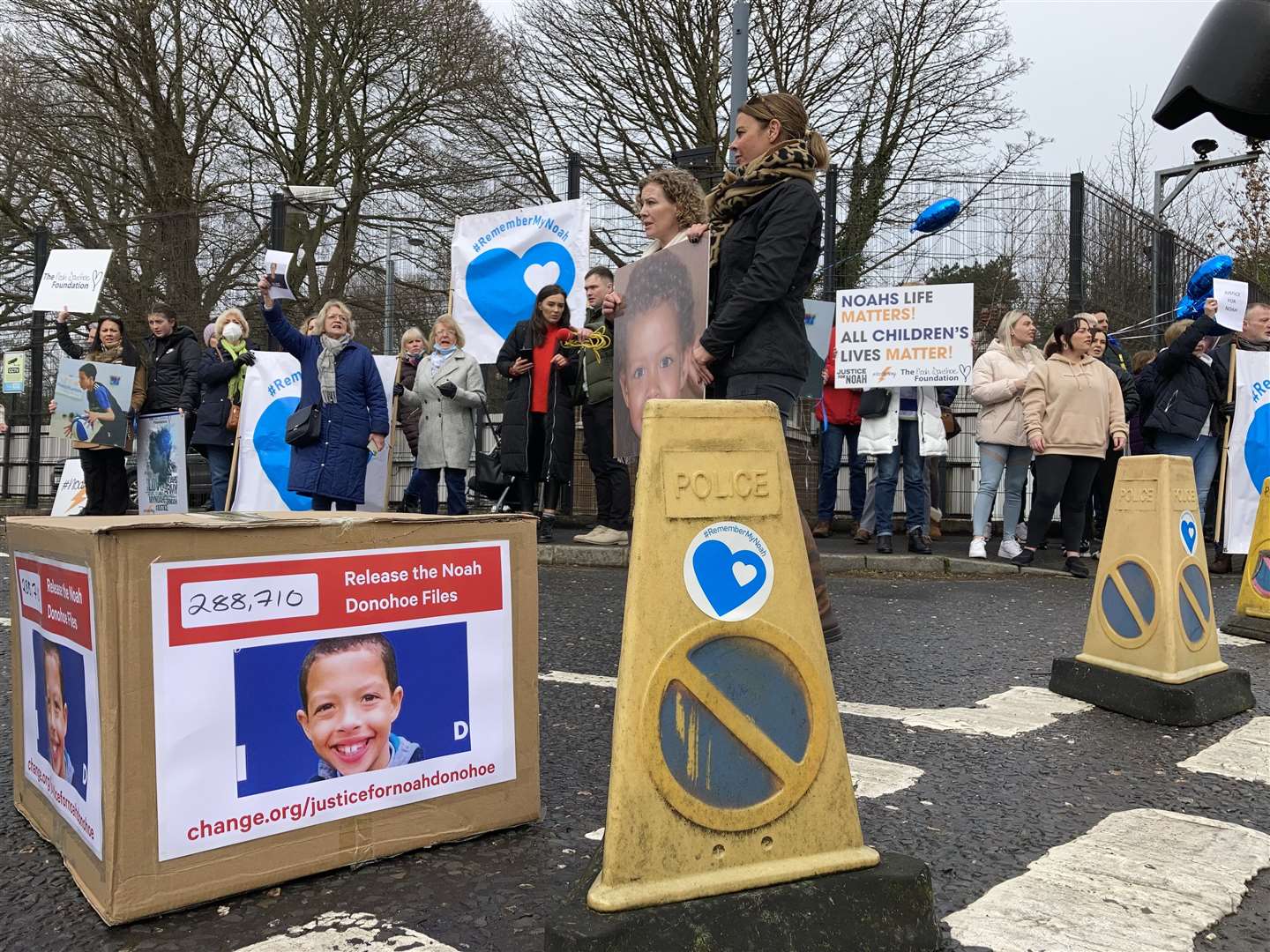 Fiona Donohoe delivers a petition calling for the release of files around the death of her son Noah to police headquarters in Belfast (Rebecca Black/PA)