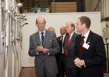 HRH Duke of Kent is guided through Aqualisa's factory in Westerham by technical director Chris Gee