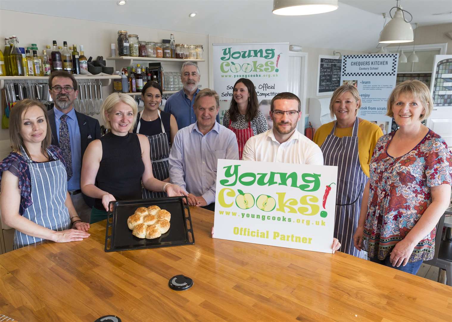 Young Cook summer launch, sponsors attending a cooking lesson at Chequers Cookery School, Golf Road, Deal.Picture Submitted by: Martin AppsKM Group has permission to sell this image via photo sales and to re-sell the image to other media for single-use publication. (2400863)