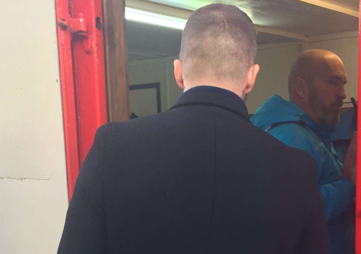 Dover kitman Richard Harvey shows David Beckham into the Dover dressing room