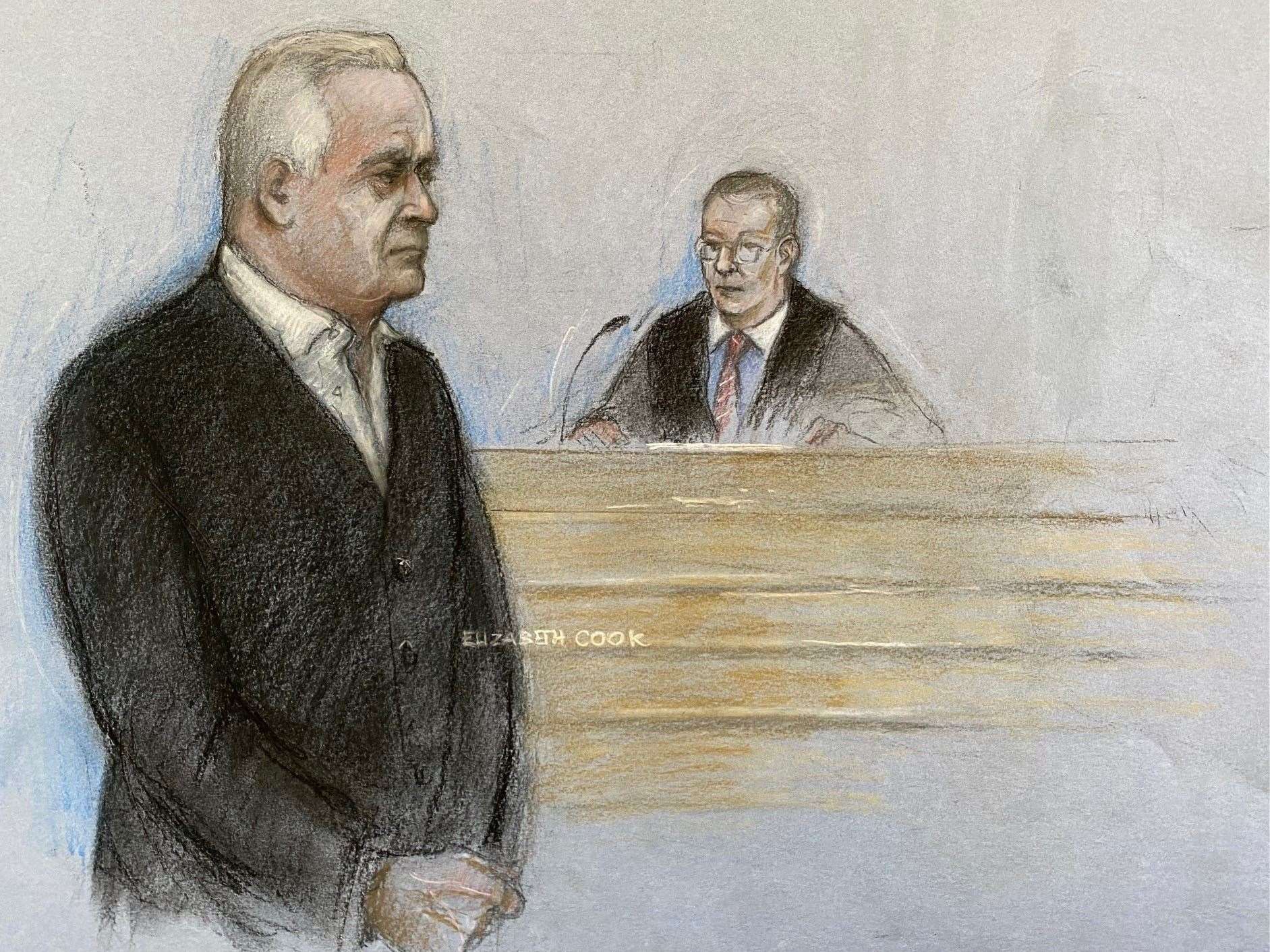 Court artist drawing of former BBC broadcaster Huw Edwards standing in the dock at Westminster Magistrates’ Court (Elizabeth Cook/PA)