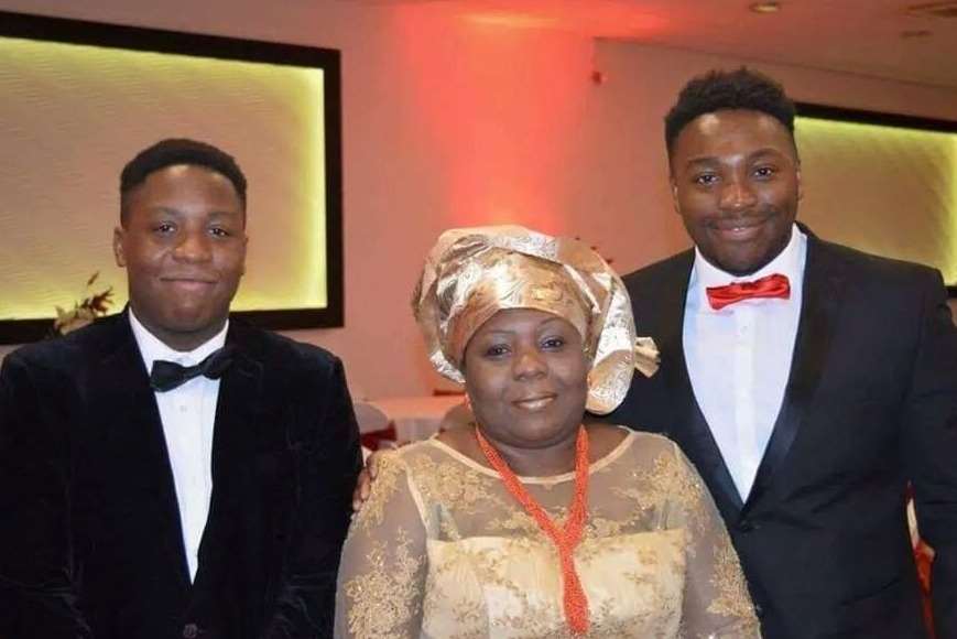 Care worker Carol Jamabo (centre), with her sons Tonye Selema and Abiye Selema (Family handout/PA)