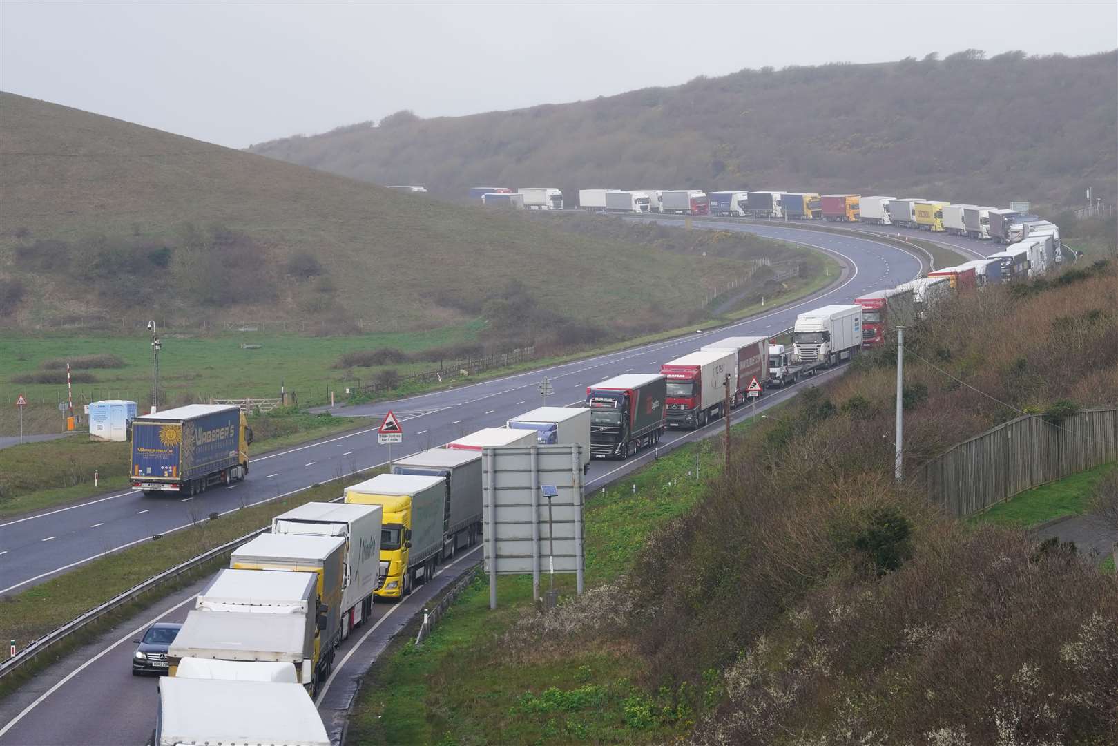 Lorries queueing on the A20 to get to the Port of Dover in Kent as the Easter getaway begins (Gareth Fuller/PA)