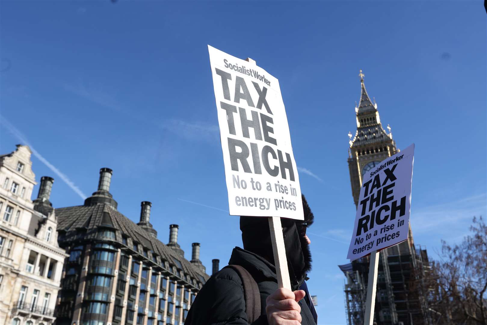 Placards were waved in Parliament Square, central London (David Parry/PA)