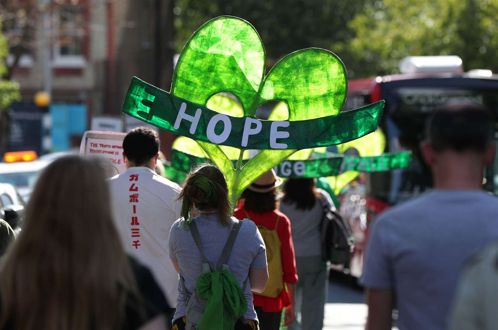 People taking part in a silent walk along Cambridge Gardens in London on the third anniversary of the Grenfell Tower fire (Jonathan Brady/PA)