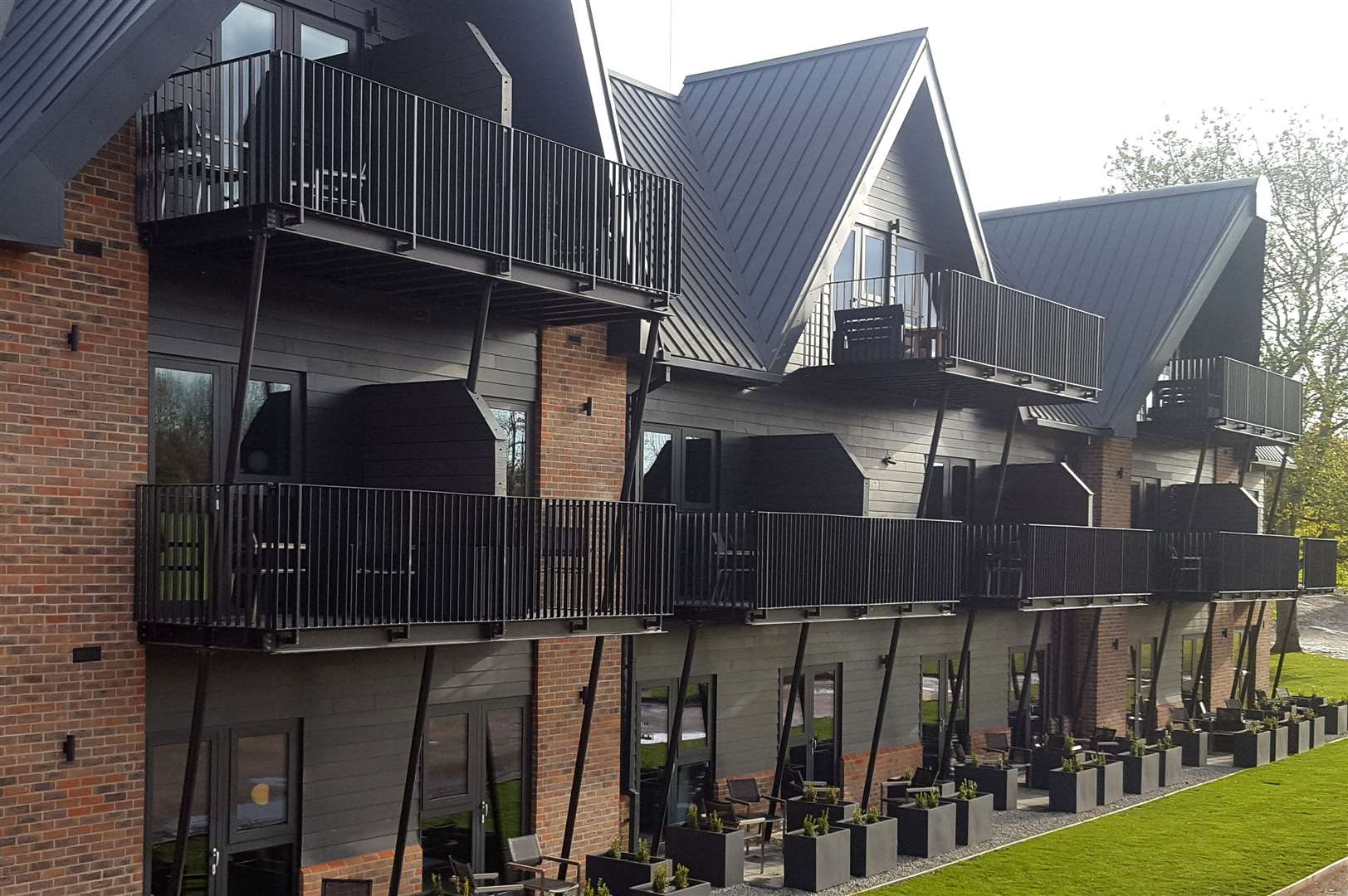 Many of the rooms have a balcony with views over the golf course and countryside