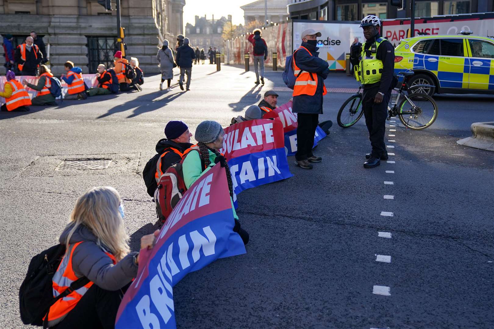 Protesters from Insulate Britain blocking Great Charles Street Queensway in Birmingham (Jacob King/PA)