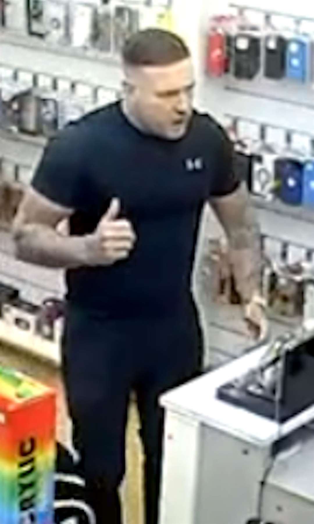 Police have released a CCTV image of a man who may be able to assist inquiries into an assault in a shop in Canterbury High Street. Picture: Kent Police