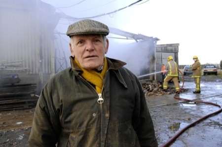 Farmer Richard Ovenden at the scene of the barn fire