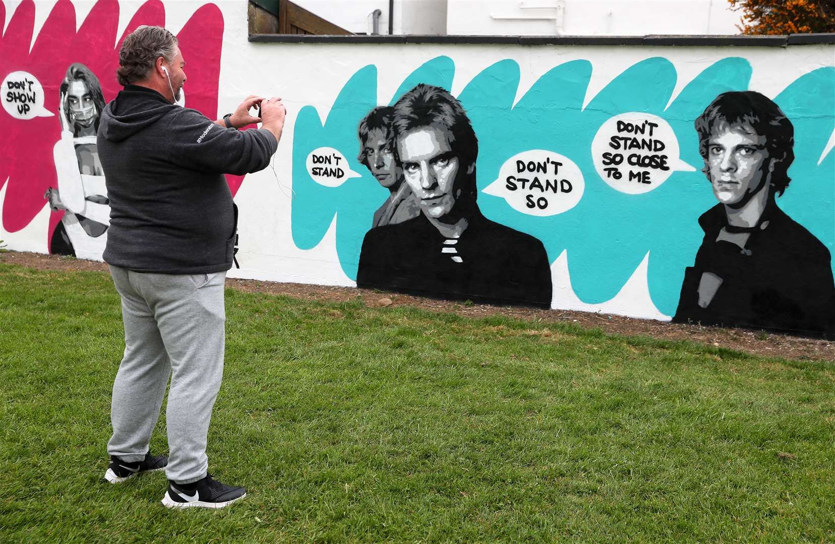 She finished her Police mural on Saturday night (Brian Lawless/PA)