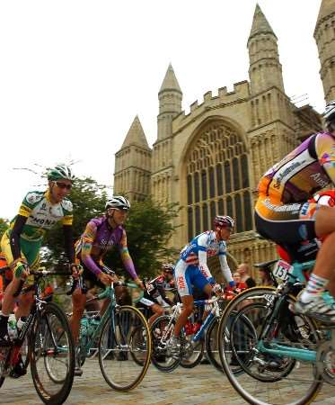The riders make their way past Rochester Cathedral. Picture: MATTHEW READING