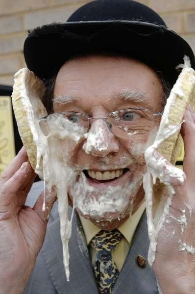 Cllr Mike Fitzgerald getting splatted with a custard pie