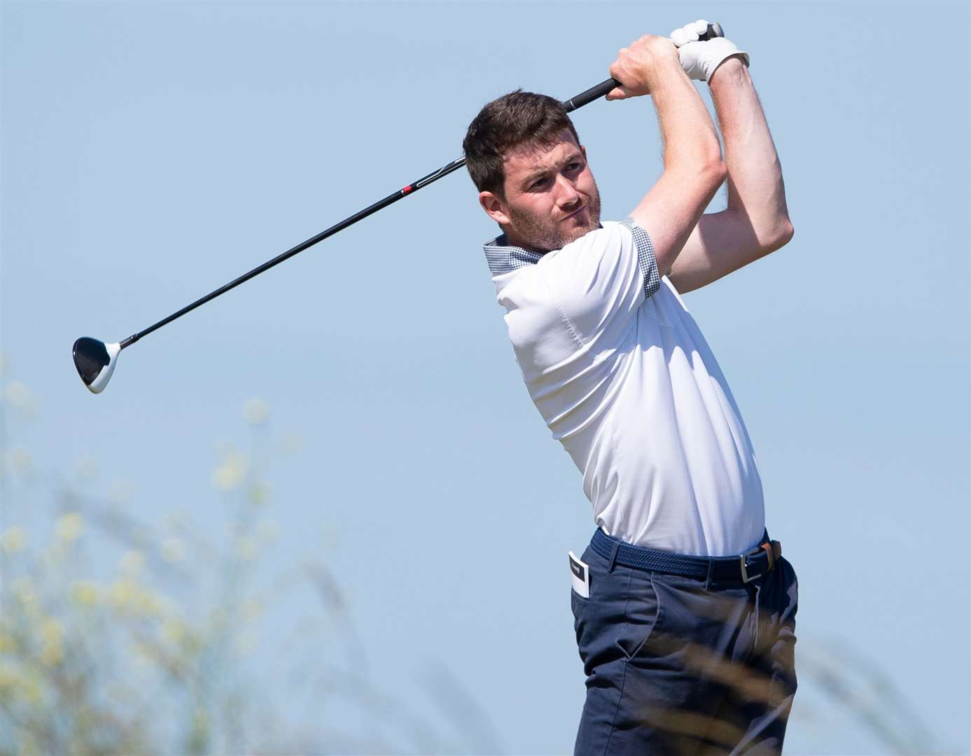 Chislehurst's Liam Burns tees off from the 13th at Prince's. Picture: Ady Kerry