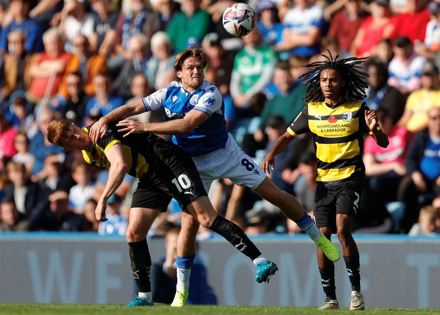 Midfielder Armani Little battles for the ball for Gillingham against Barrow Picture: @Julian_KPI