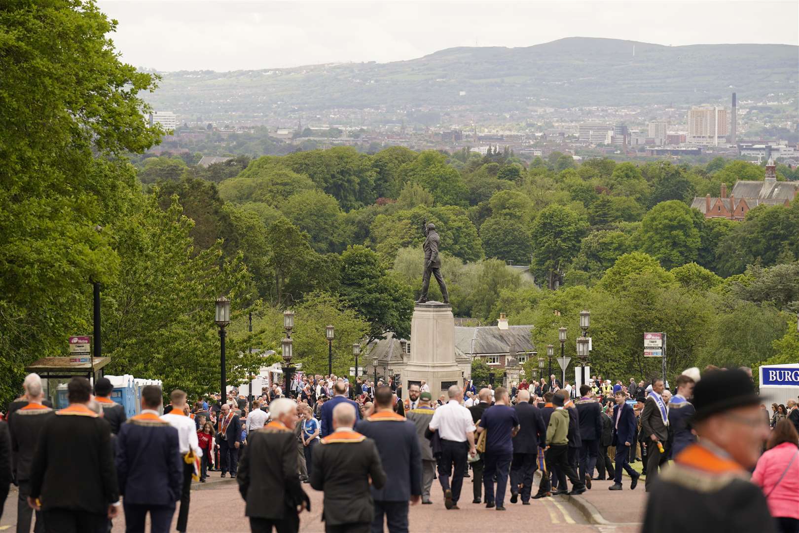 Orangemen file past the statue of Sir Edward Carson (Niall Carson/PA)