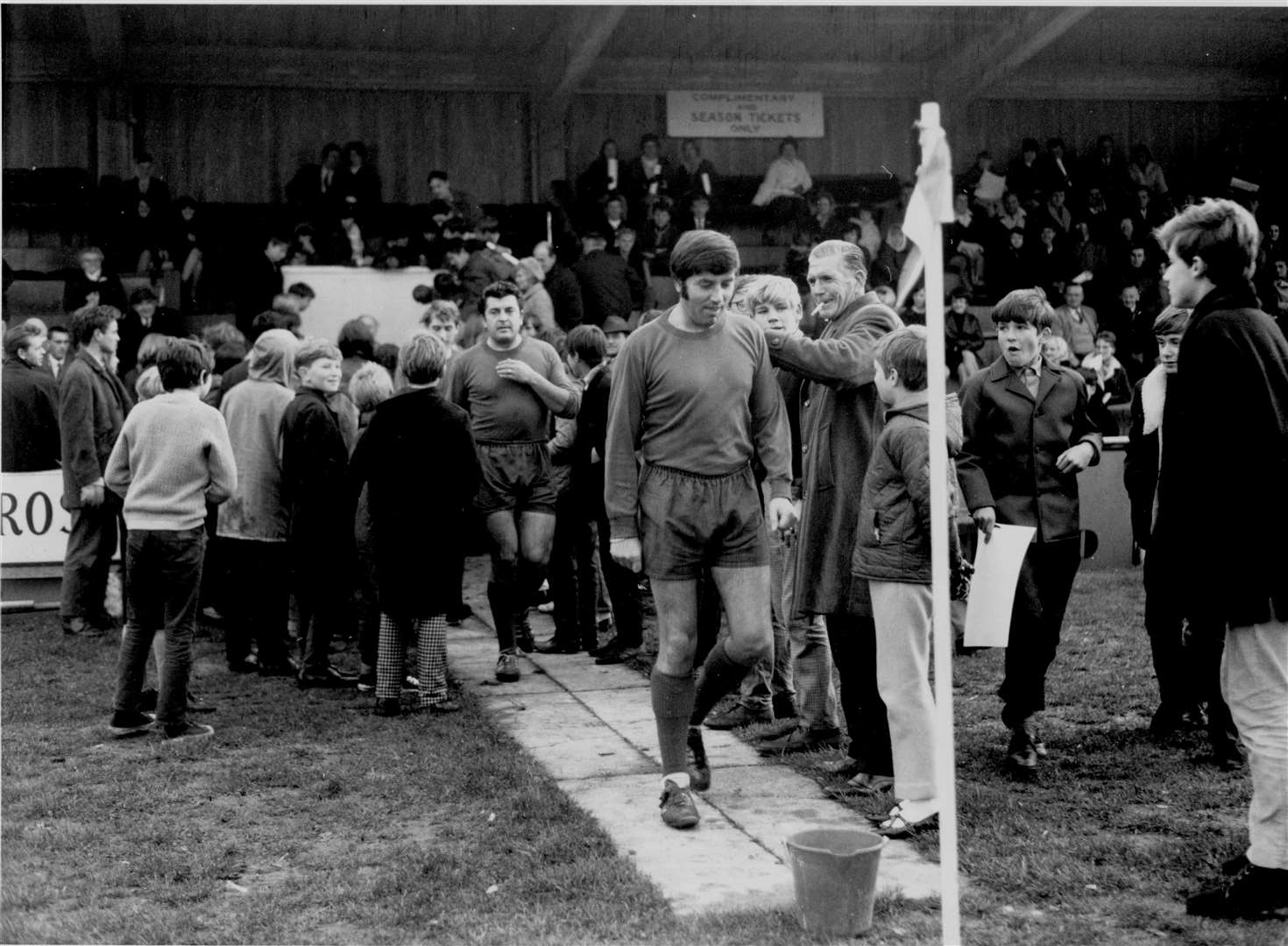 Comedian Jimmy Tarbuck leads a showbiz XI on to the field at Kingsmead in Canterbury in November 1967 for a charity match against past and present Canterbury City players. His team included ex-Spurs and Northern Ireland international Danny Blanchflower and Ray Davies of The Kinks. Canterbury won 7-5 (with Tarbuck scoring two)