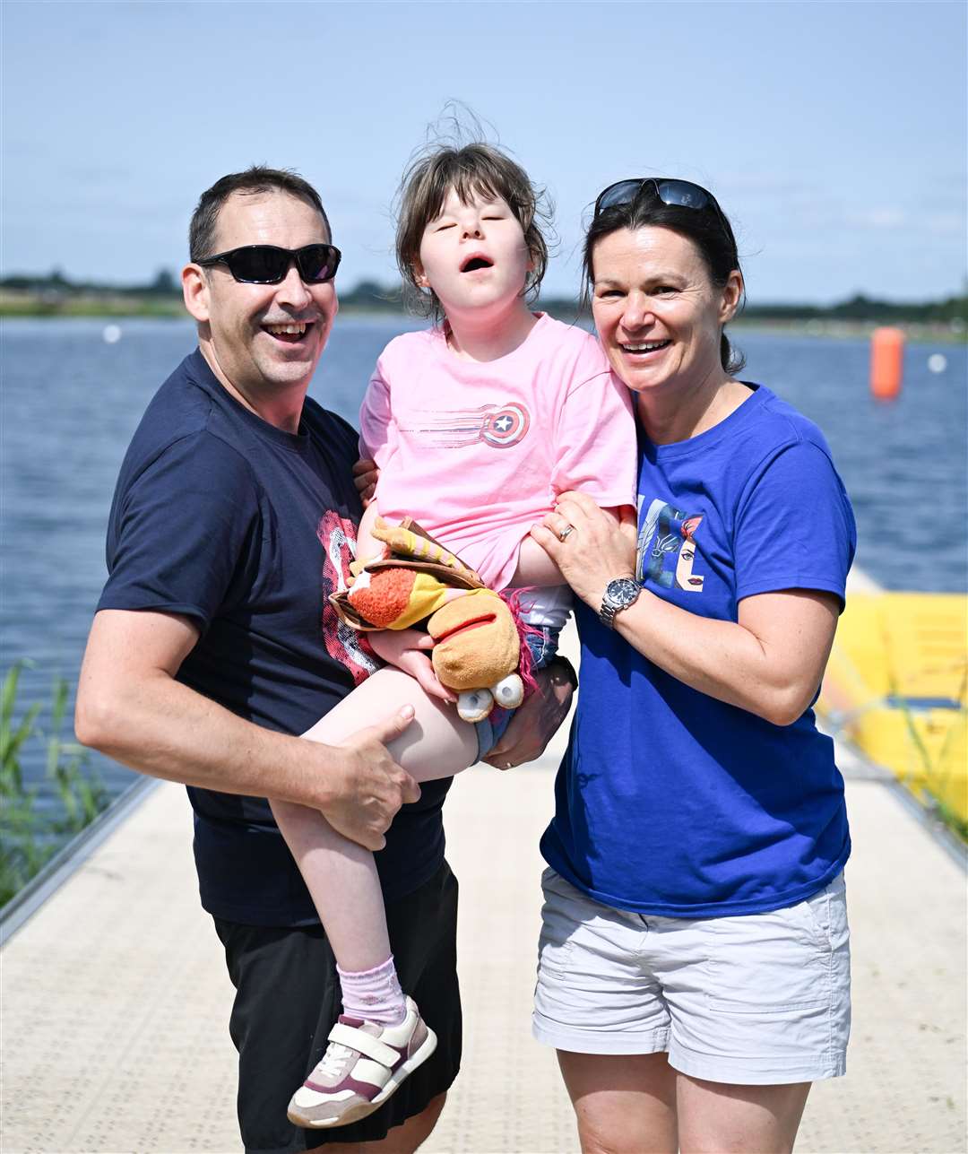 Eve Williams (middle) has a rare condition (Superhero Tri powered by Marvel/Andy Hooper/PA)