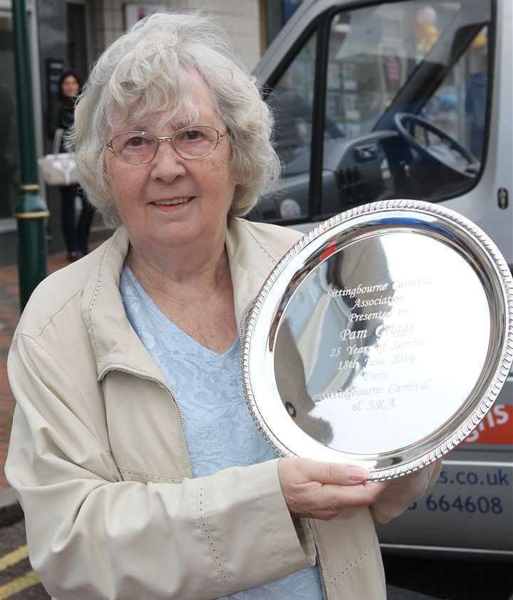 Pam Griggs with a shield to mark serving 25 years of chairing the Sittingbourne Carnival Association. Picture: John Westhrop