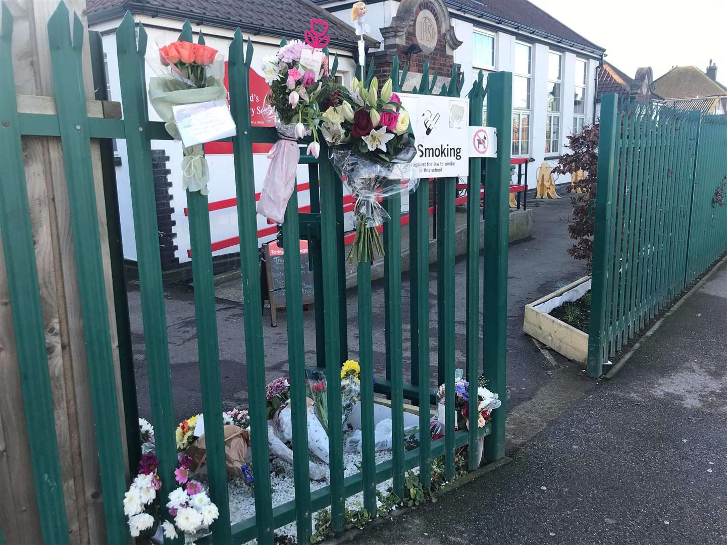 Floral tributes have been left outside St Edward's Primary School in Sheerness