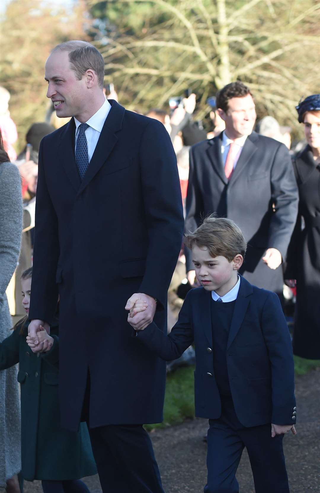 George arrives with William and Charlotte at the Christmas Day church service at St Mary Magdalene Church in Sandringham (Joe Giddens/PA)