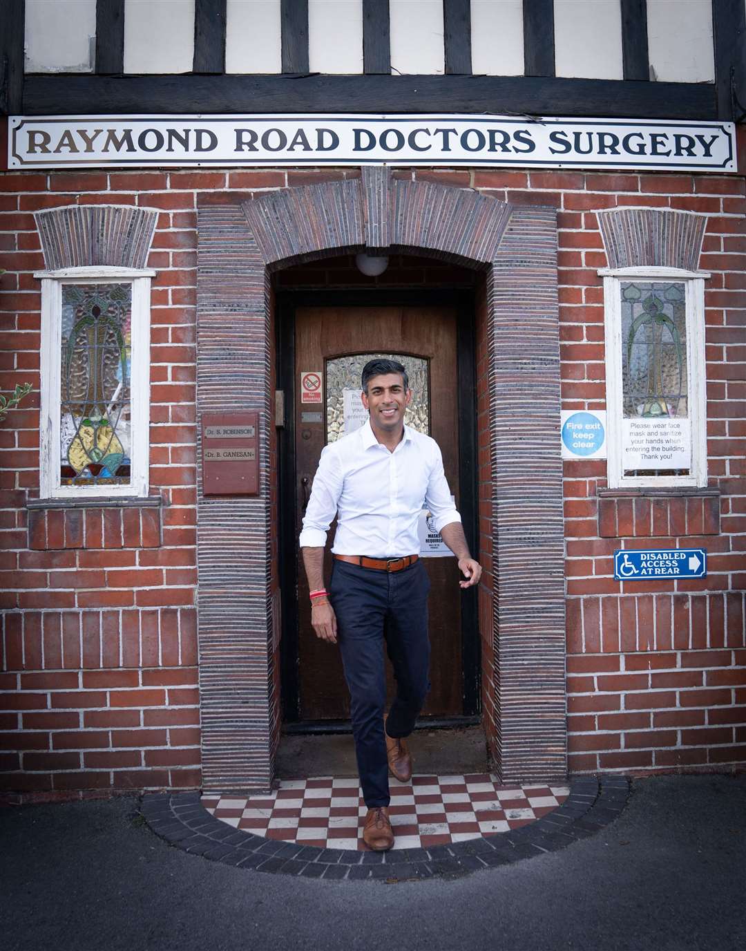 Rishi Sunak during a visit to his father’s old surgery (Stefan Rousseau/PA)