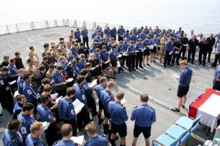 We will remember them: the crew of HMS Kent at their flight deck ceremony