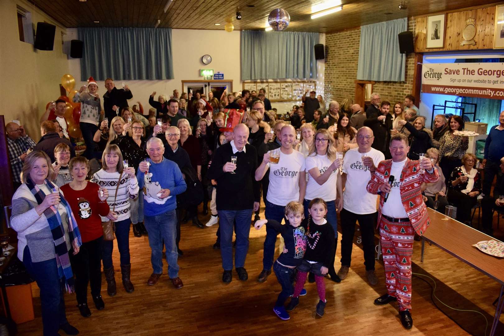 Bethersden residents, the George Community head council and Damian Green MP celebrate raising funds to buy the George Pub