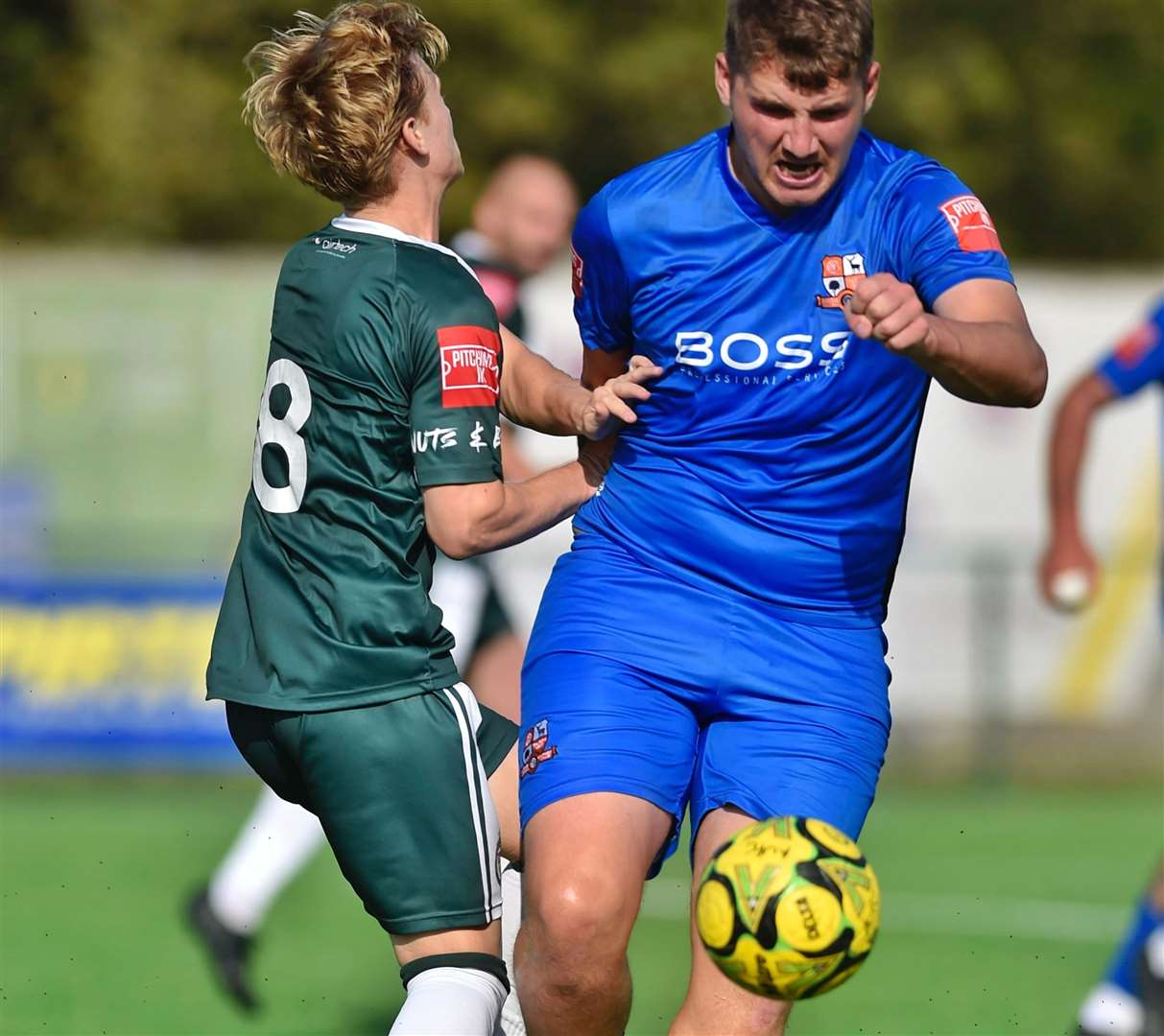 Ashford's Mikey Berry gets into the thick of the action. Picture: Ian Scammell