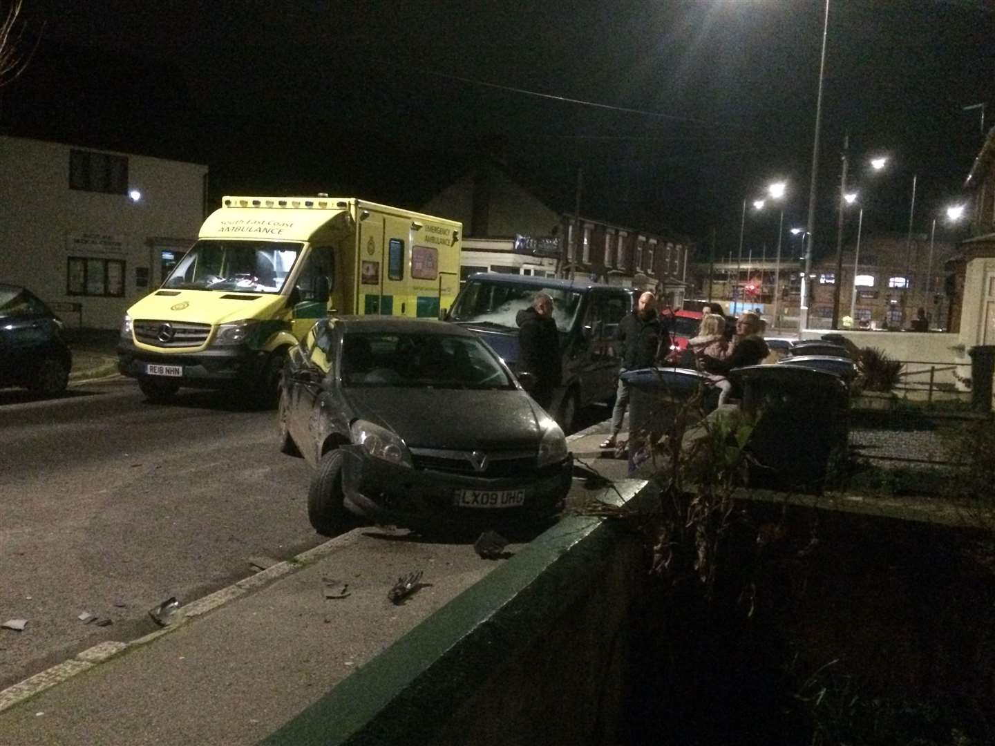 One parked vehicle was pushed up on the pavement