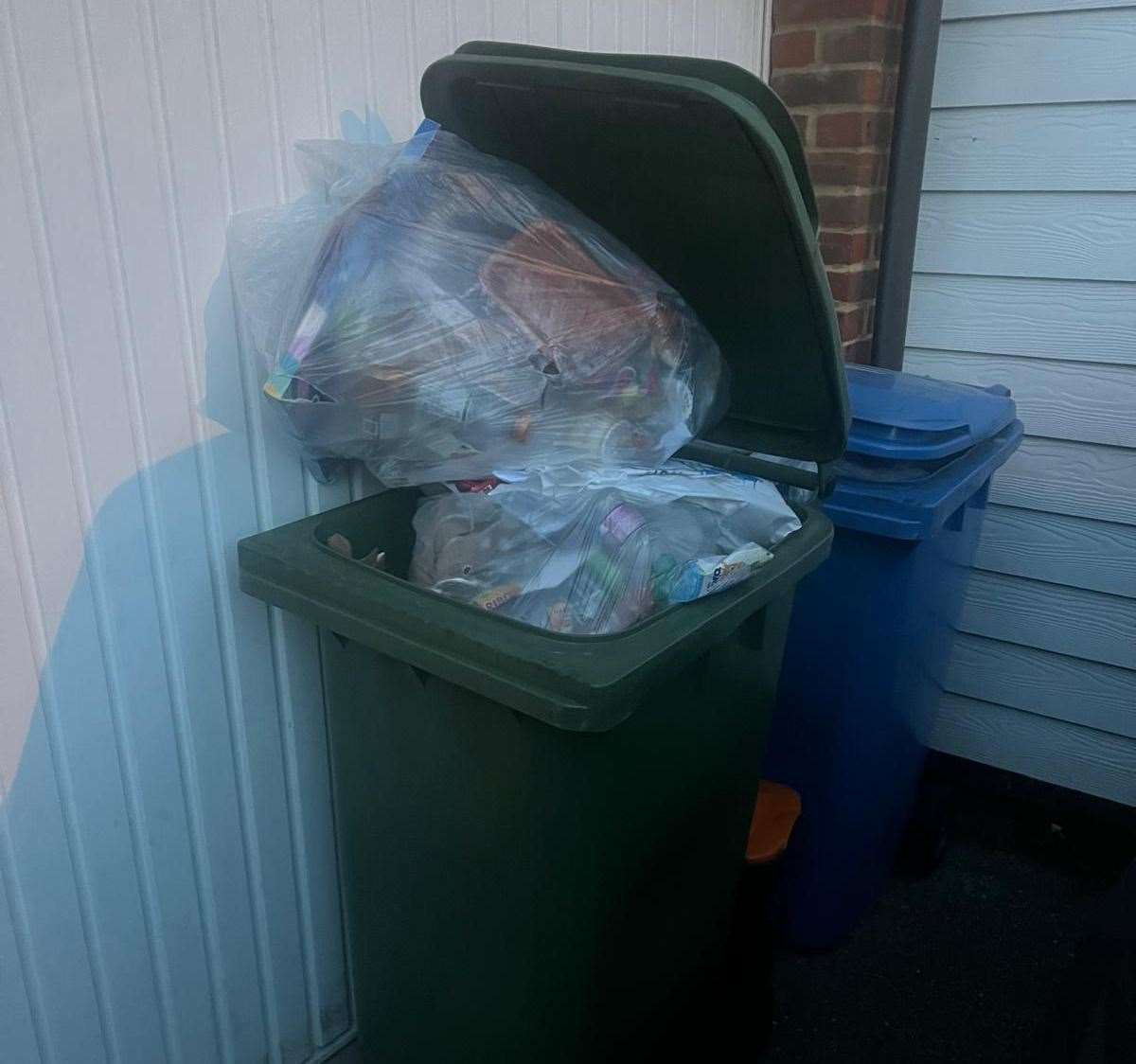 The green bin was "overflowing" due to a missed collection in Easton Drive, Sittingbourne. Picture: Hollie Wells