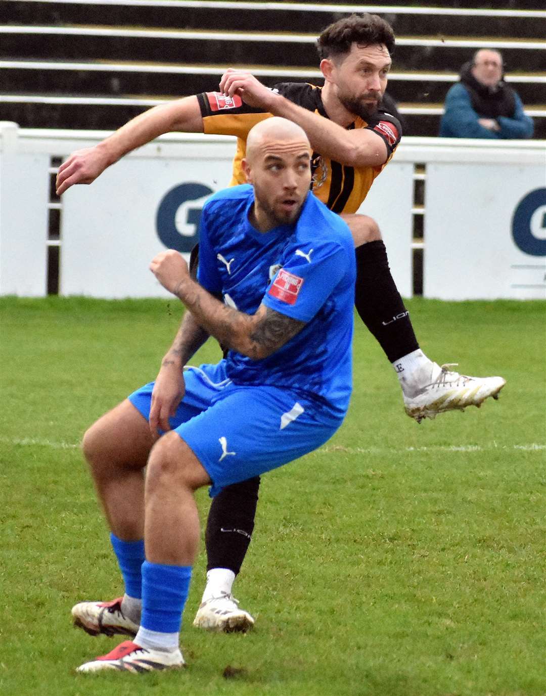 Dartford's Samir Carruthers in the thick of the action at Folkestone last Saturday. Picture: Randolph File