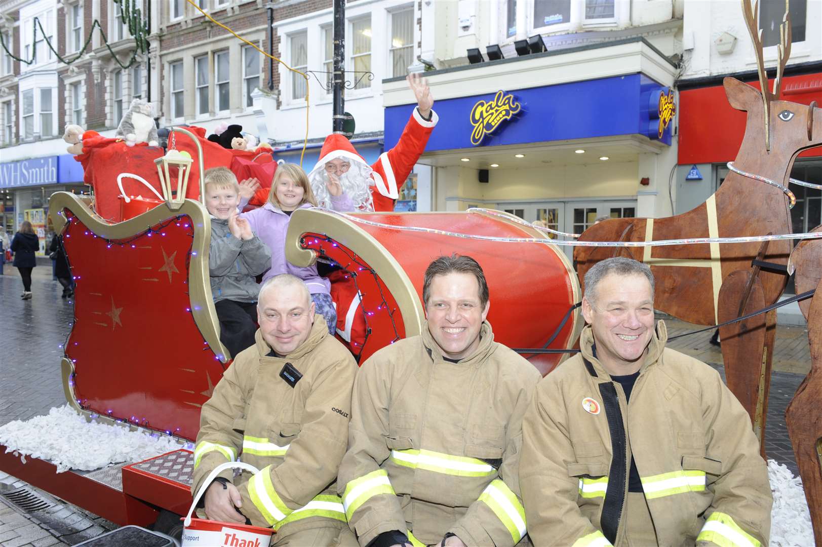 Dover fire crew will be out in Dover every day until Christmas from Saturday. Pictured is: Morgan Ireland and Jack Ireland, firefighters, Mo Moroney, Bren Ralls and Roger Hadfield. Picture: Tony Flashman FM2375990