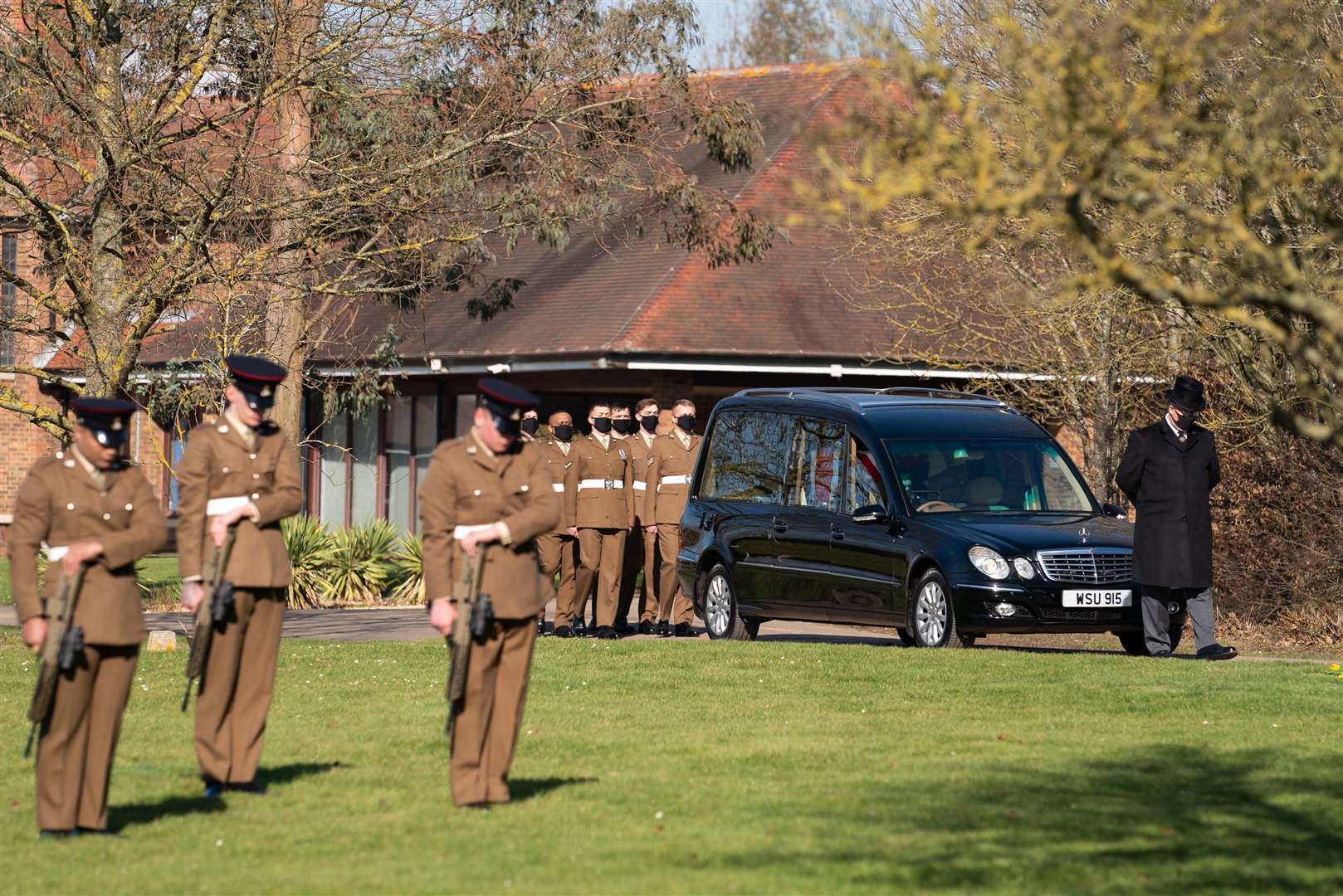 The funeral cortege arrives (Joe Giddens/PA)