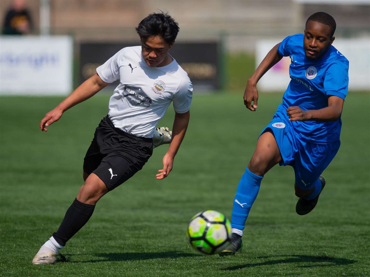 Dover Athletic under-16s (white) get ahead of Bromley under-16s. Picture: PSP Images