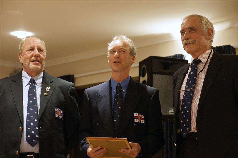 Paul Jarvis (centre) with coxswain Robin Castle (left) and lifeboat operations manager Colin Washford