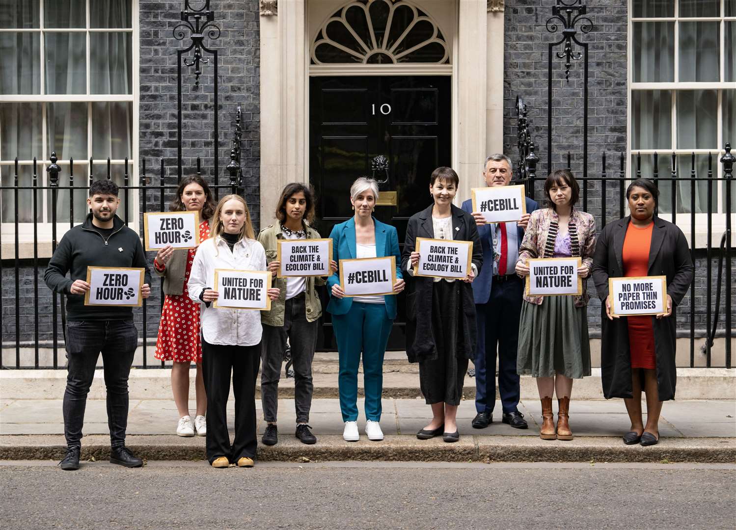 MPs from different parties joined the youth activists outside Downing Street as they handed in their petition (Doug Peters/PA)