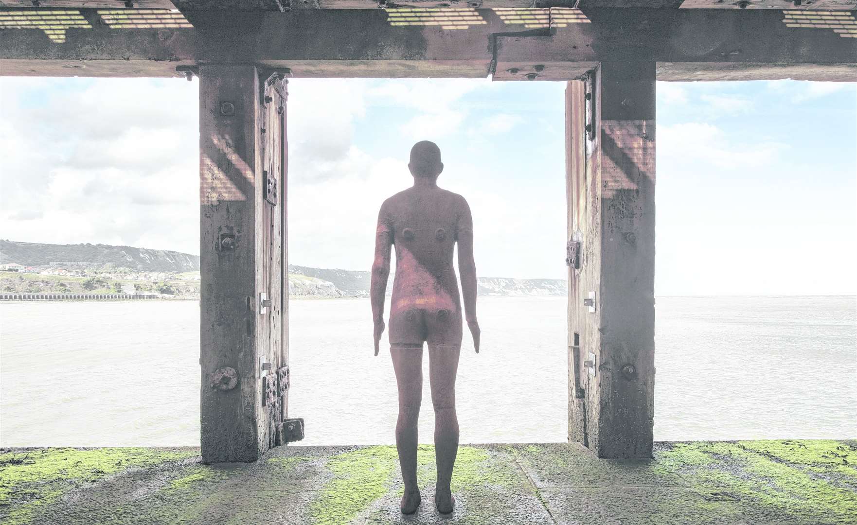 Antony Gormley's cast iron statue is staying in Folkestone's Harbour Arm