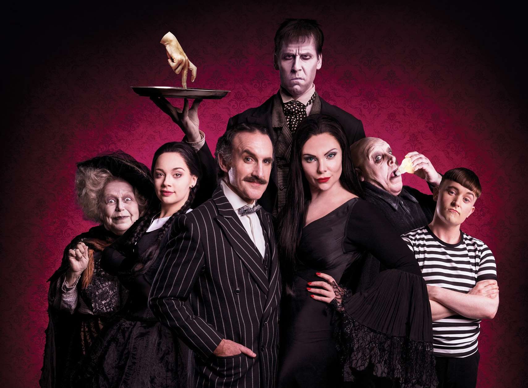 Valda Aviks, Carrie Hope Fletcher, Cameron Blakely, Dickon Gough, Samantha Womack, Les Dennis and Grant McIntyre in the Addams Family. Picture: Matt Martin