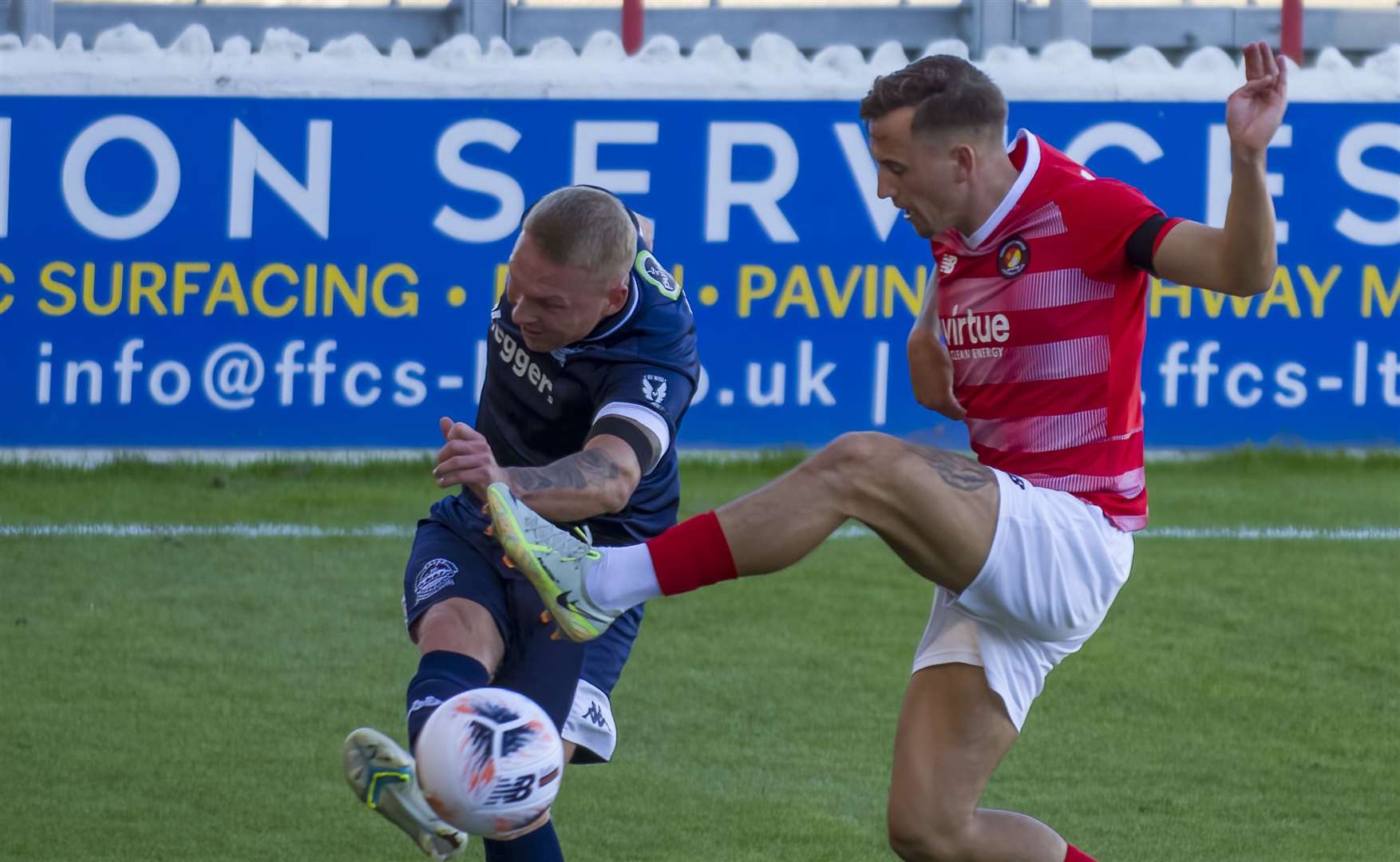 Ebbsfleet United's Ben Chapman closes down Dover Athletic full-back Myles Judd as Whites are knocked out of the FA Cup. Picture: Ed Miller / EUFC